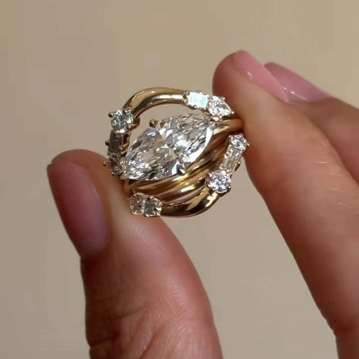 Set worn as double-stacked wedding rings. Alt: “Double Stacked Style: Oval Diamond Bridal Set.”