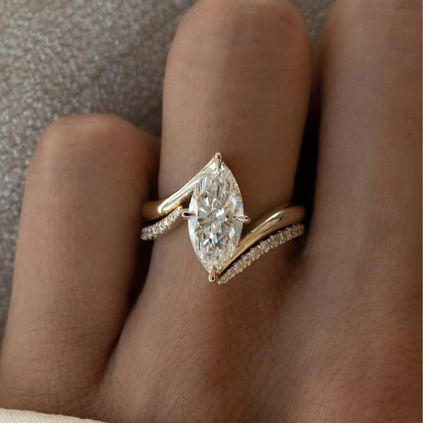 Yellow gold marquise stacking set on neutral background. Alt: “3ct Marquise Diamond Stacking Set – 18K Yellow Gold.”