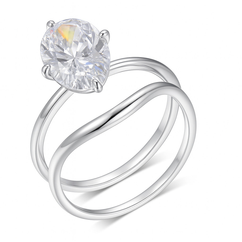 Gold engagement set on neutral/romantic background. Alt: “4.5ct Oval Moissanite Engagement Ring Set – Gold.”