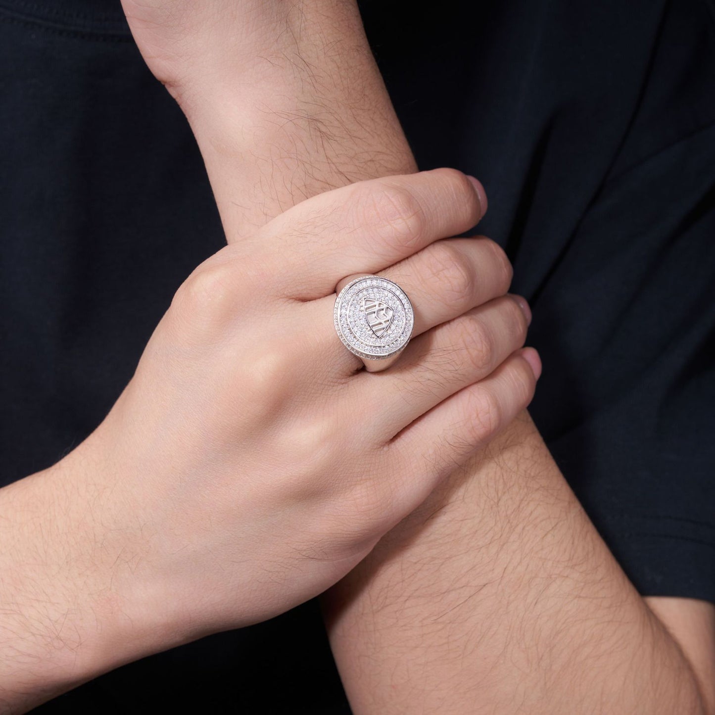 Male model wearing the ring on finger.