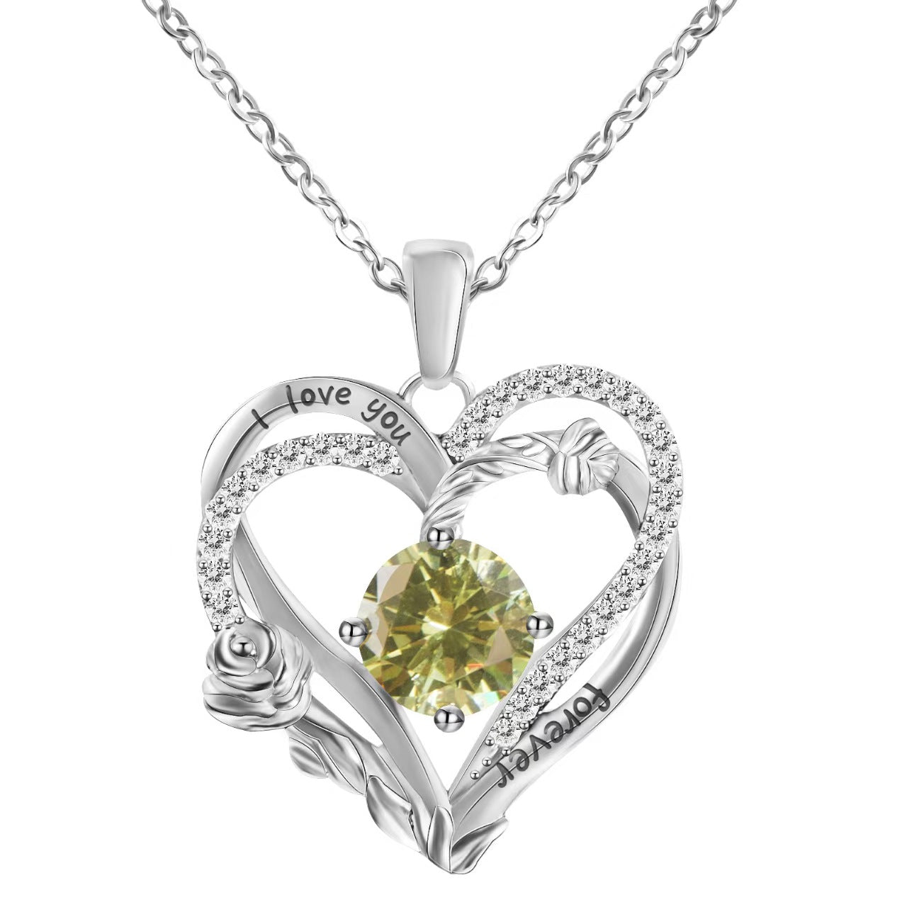 Heart-shaped pendant with green gemstone and 'I love you' engraving on a white background