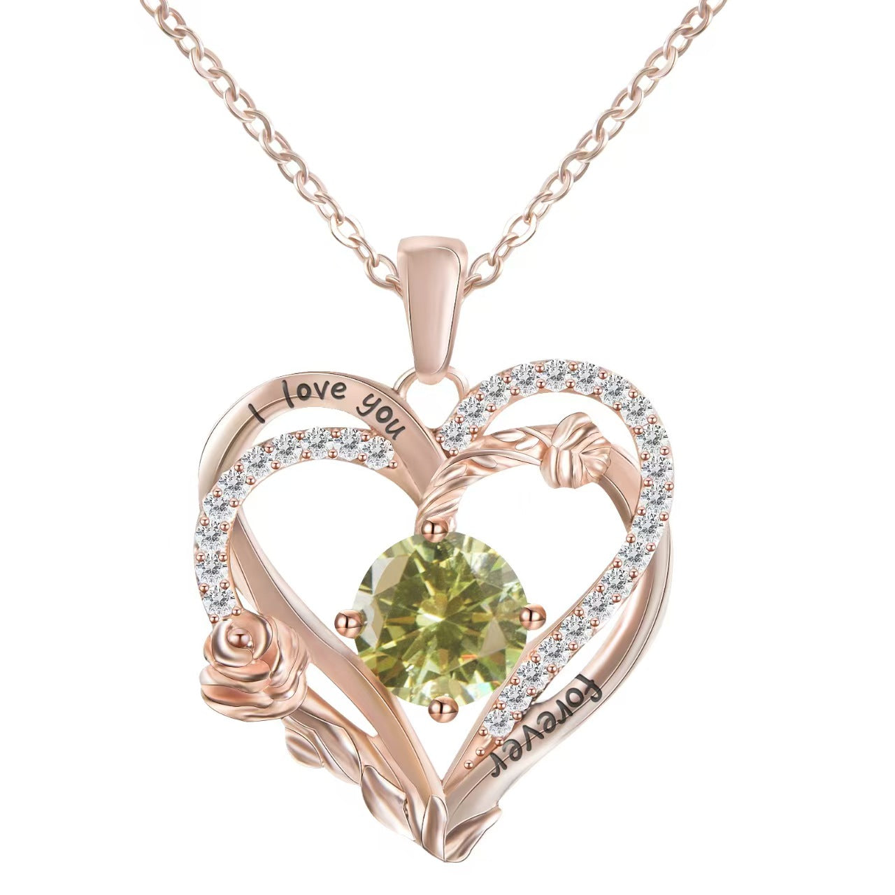 Heart-shaped rose gold pendant with green gemstone and 'I love you' engraving on a white background