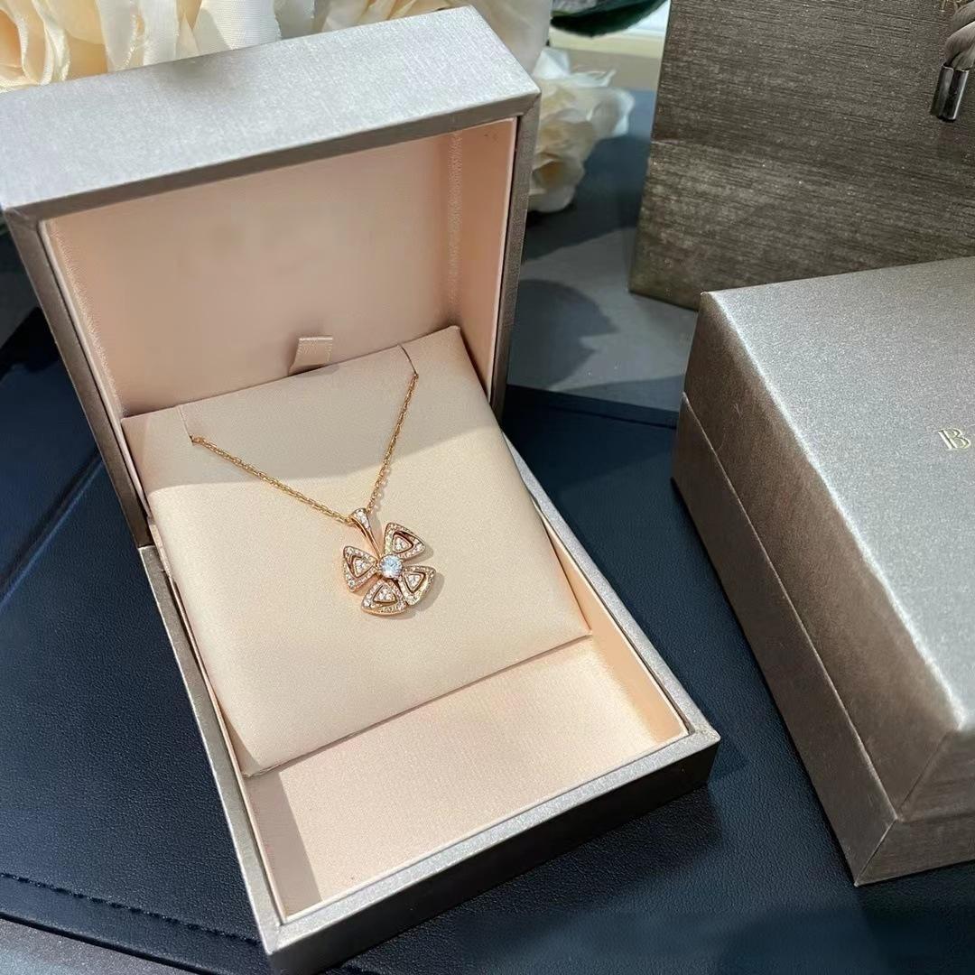 BVLGARI Fiorever Necklace Fiorever 18 k rose gold necklacewith a pendant in an open jewelry box on a dark surface