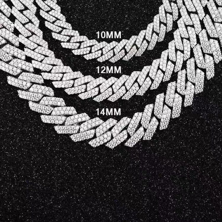 Three diamond-encrusted chains of different widths on a black background