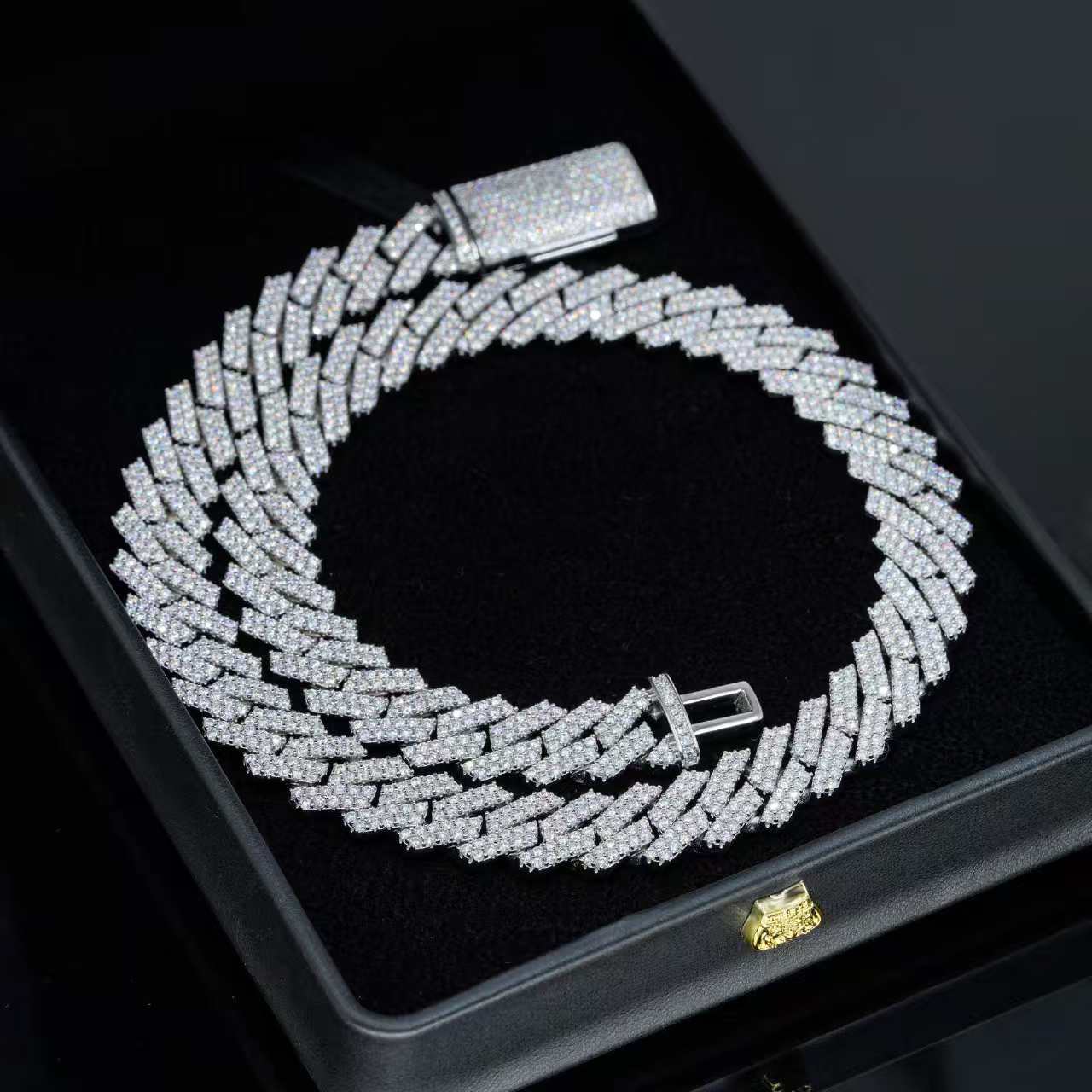 Silver chain necklace on a black display box