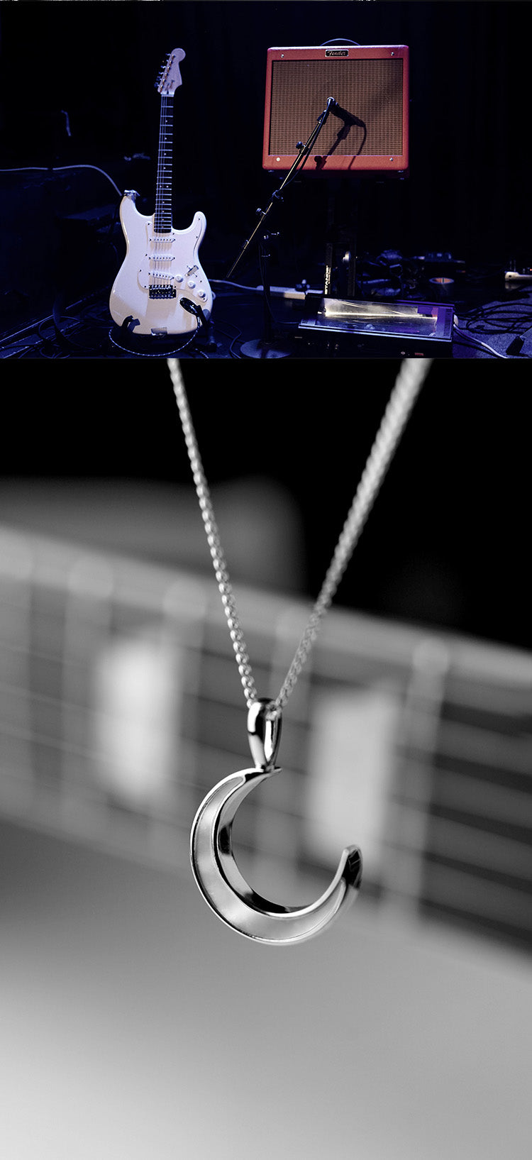 Silver crescent moon necklace with a blurred background of musical instruments.