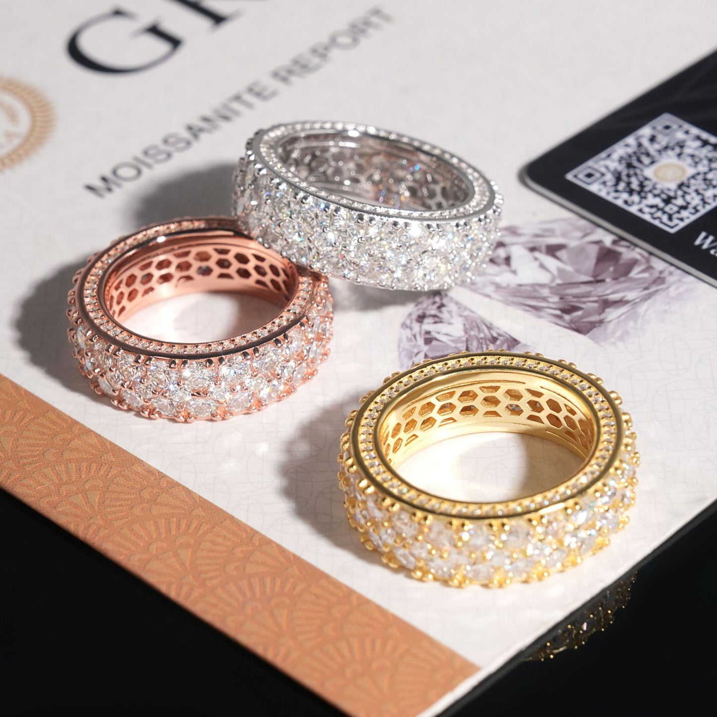 Gold eternity band on dark background, showing continuous pavé sparkle. Alt: “Full-Pavé Moissanite Eternity Ring – 18K Gold Unisex.”