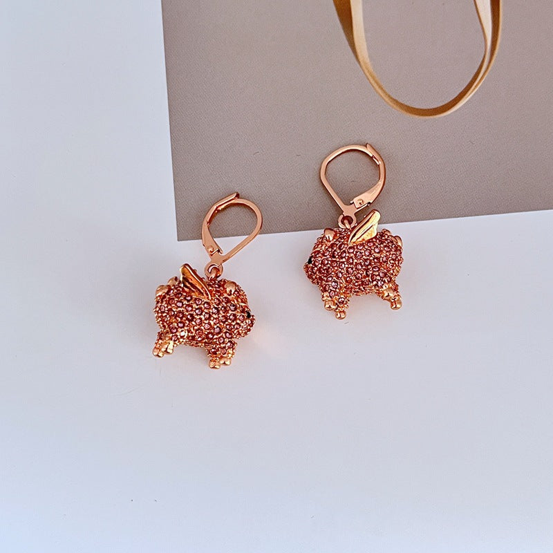 Macro focus on the flying figure, showcasing its movement and any star/cloud details. Alt: “Dreamy Flying Figure Pendant Detail – Kate Spade Imagination Necklace.”