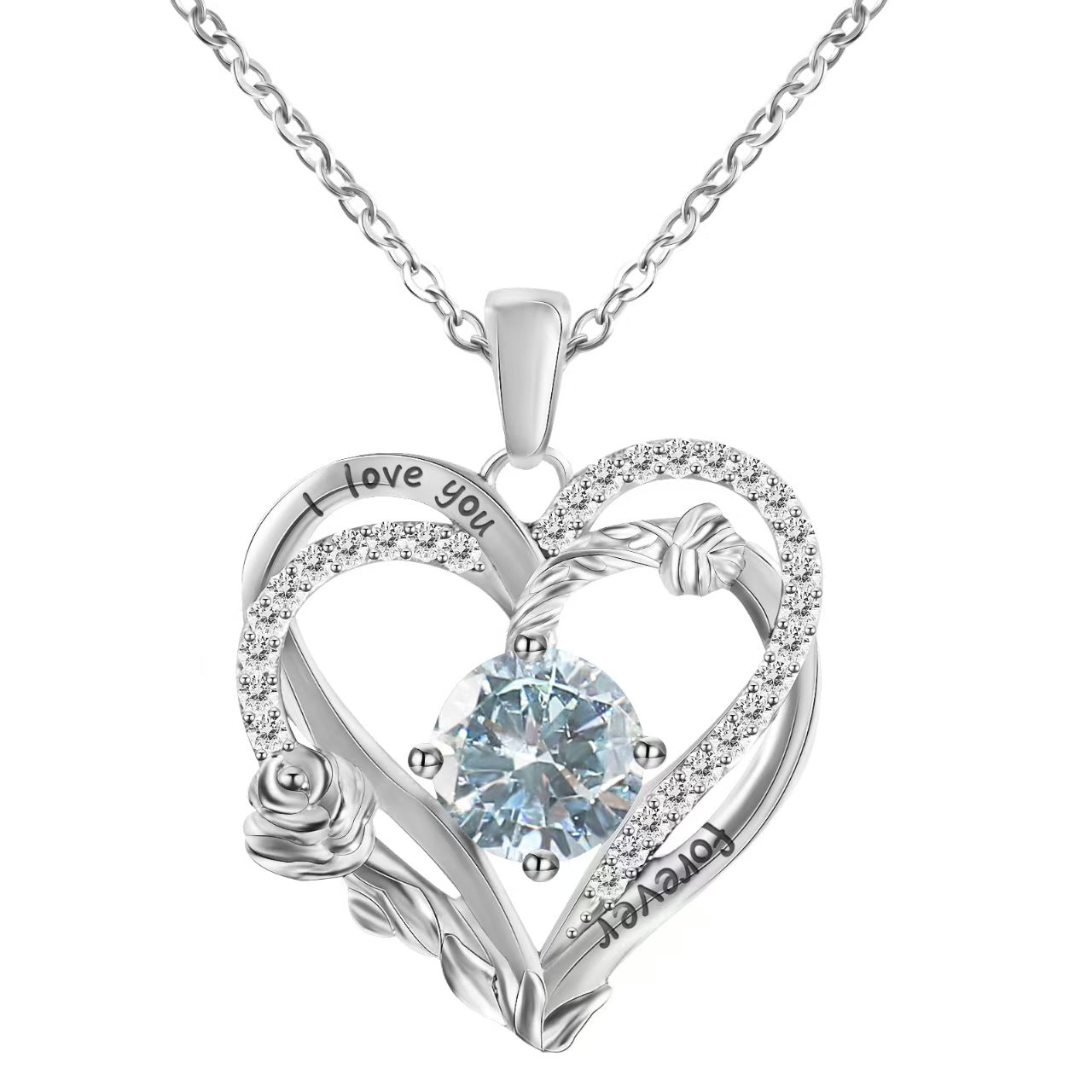 Heart-shaped silver pendant with blue gemstone and 'I love you' engraving on a white background