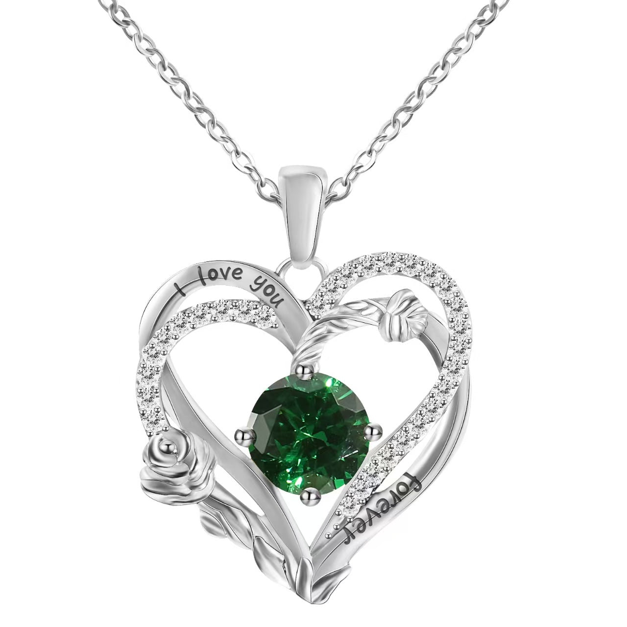 Heart-shaped silver pendant with green gemstone and 'I love you' engraving on a white background