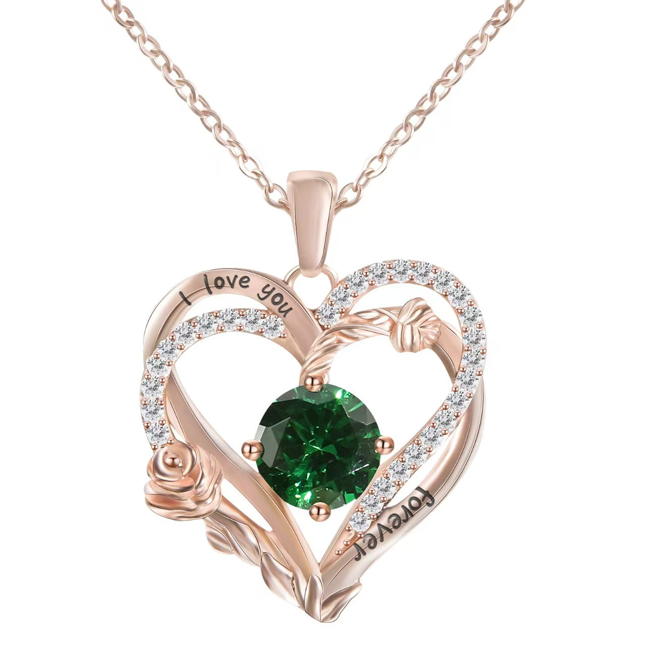 Heart-shaped pendant with green gemstone and 'I love you' engraving on a white background