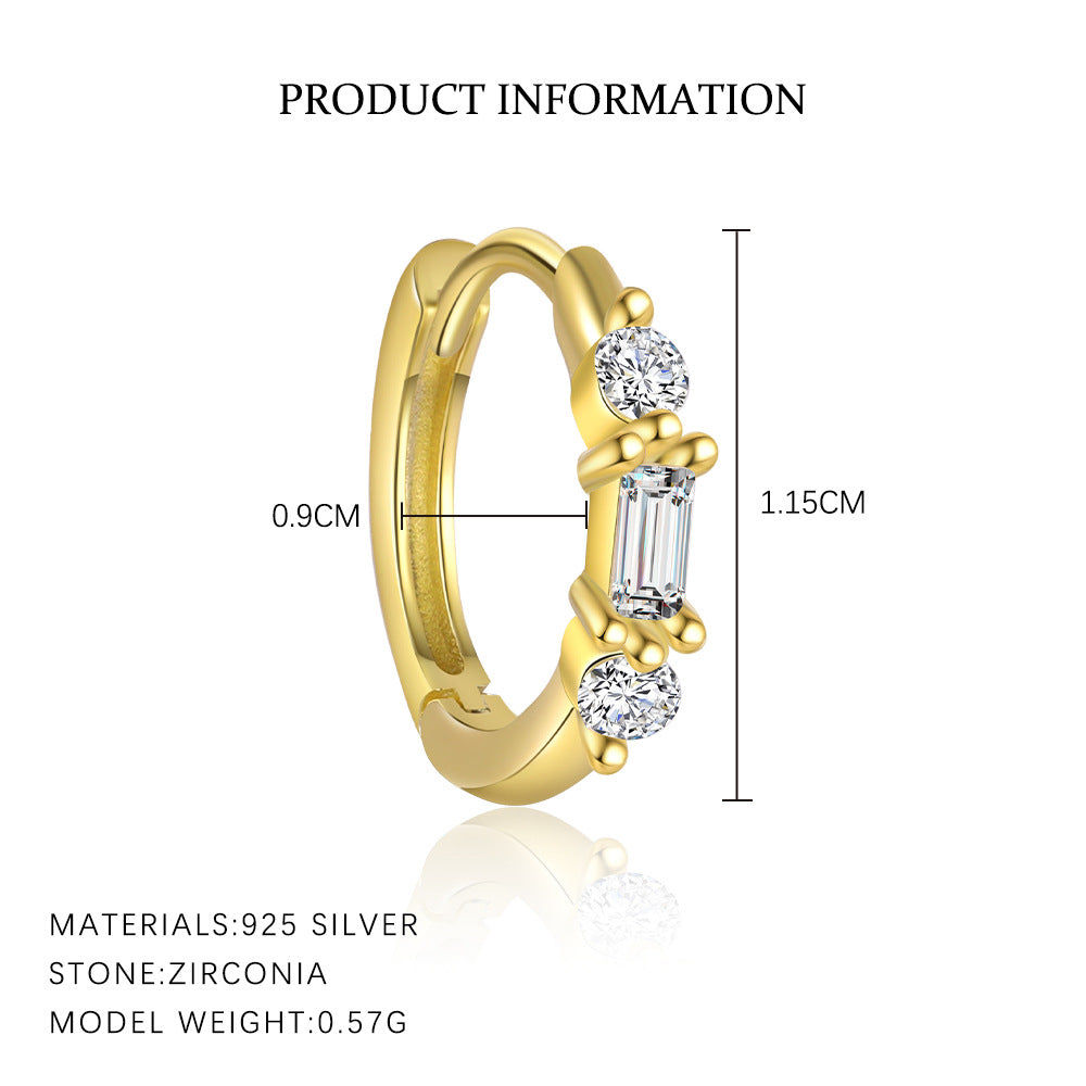 Gold ring with zirconia stones and product information on a white background