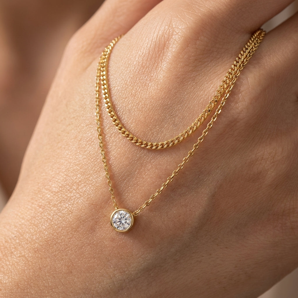 Macro, necklace draped across female hand, natural curve, warm soft light, mirror metal shine, sharp sparkle, blurred skin background, detailed texture, intimate luxury feel.