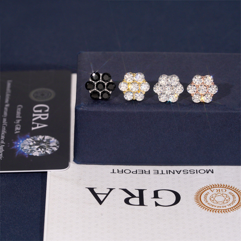 Four floral earrings on a display card with GRA certification below.