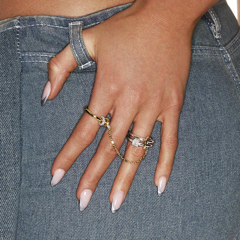 “Woman wearing elegant colorful zircon ring in sterling silver light luxury style”