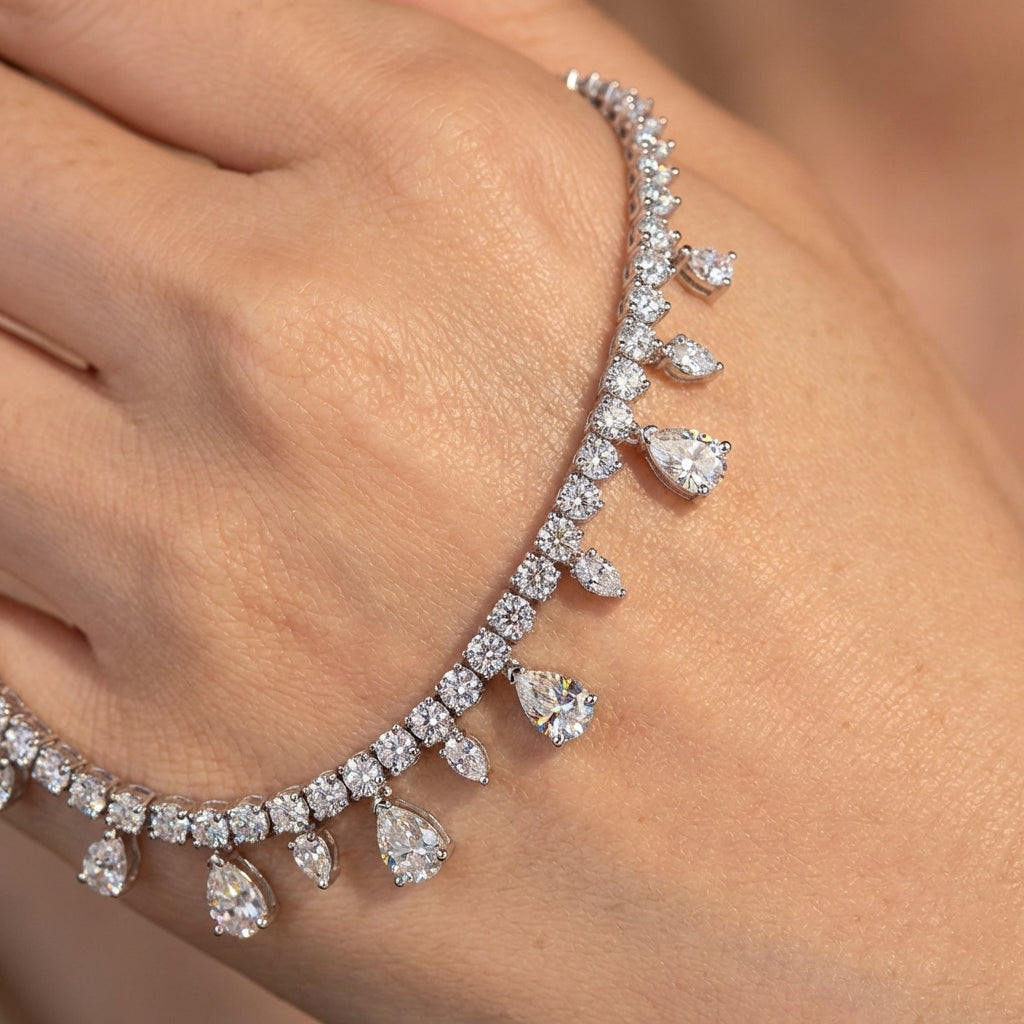 Diamond bracelet on a wrist with a blurred background