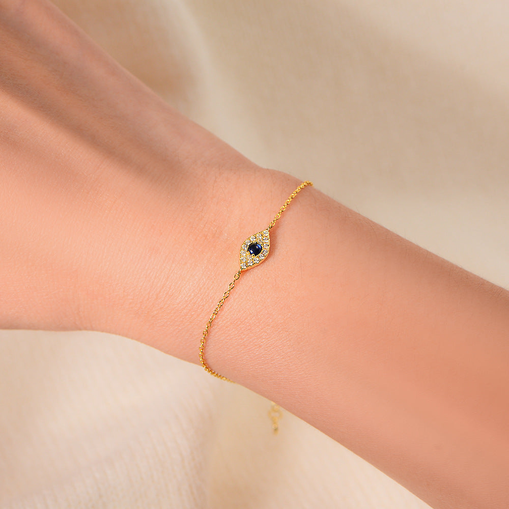 Woman Wearing Retro INS Style Evil Eye Bracelet