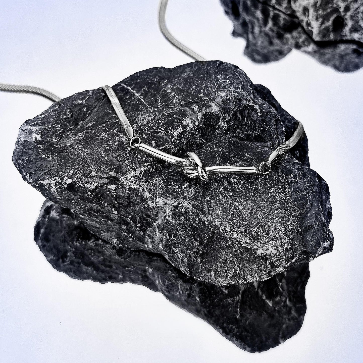 “Macro shot showing polished sterling silver texture”