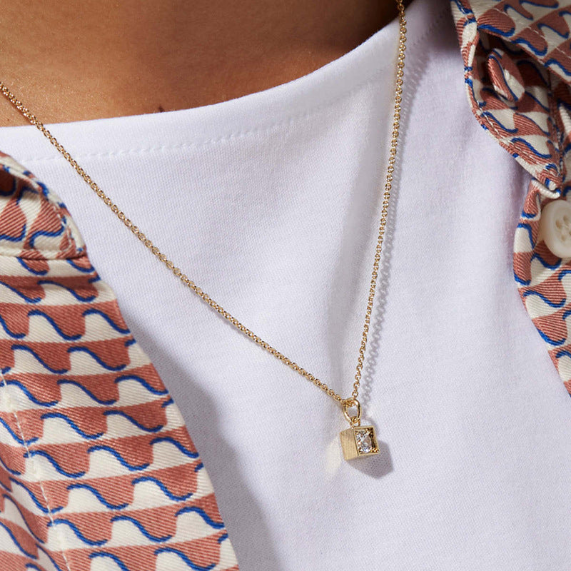 Woman Wearing Minimalist Silver Square Pendant Necklace