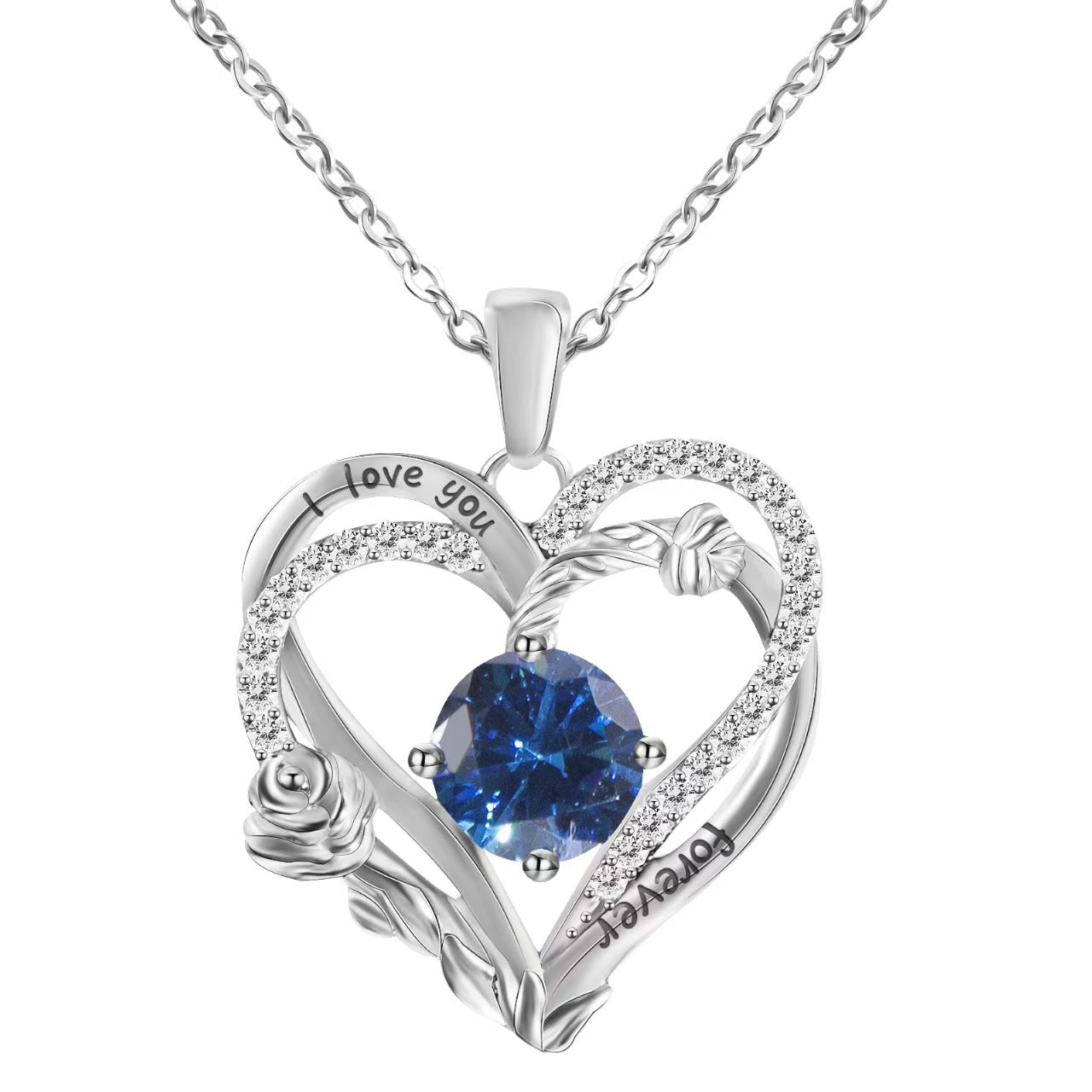 Heart-shaped silver pendant with blue gemstone and 'I love you' engraving on a white background