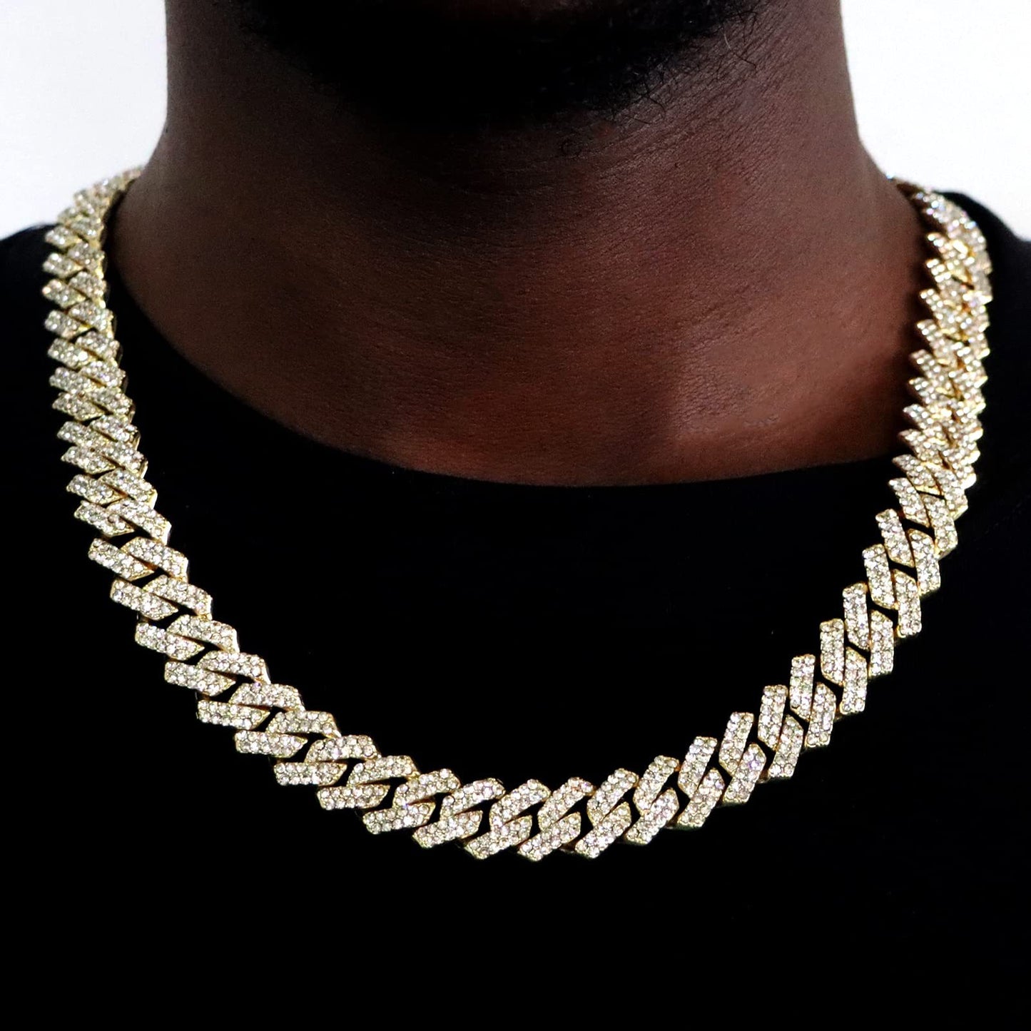 Male model wearing the necklace on bare skin or with an outfit.