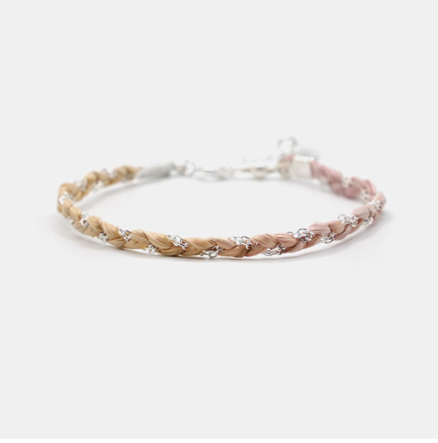 Bracelet with braided design on a white background