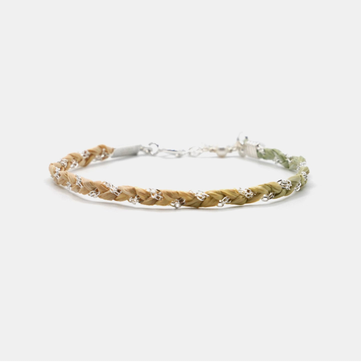 Bracelet with braided design on a white background