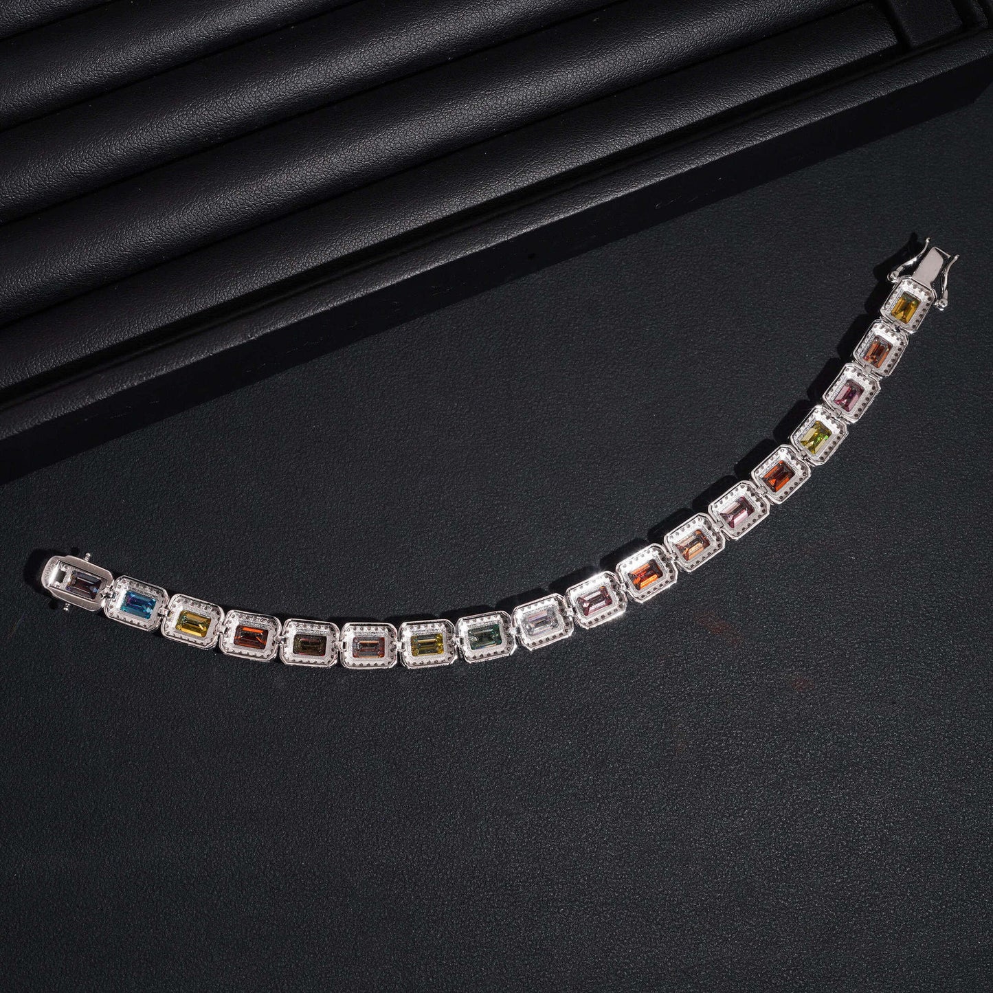 Focus on the color saturation, the precision of the stone settings, and the facet brilliance of each color.