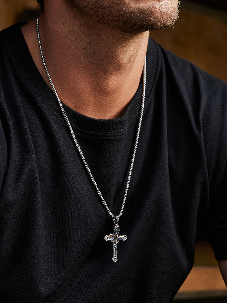 “Unique snake cross pendant styled with men’s casual outfit”