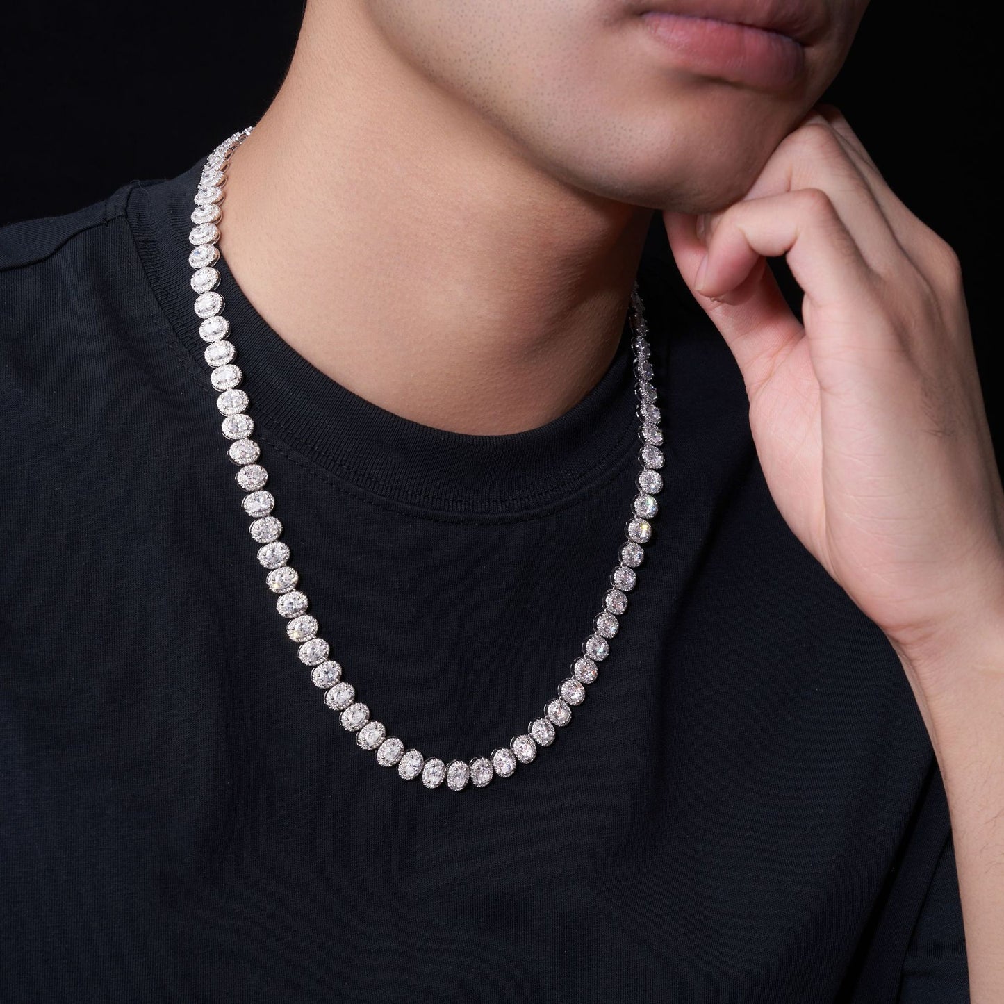 Female model wearing the necklace on bare skin or with an outfit.