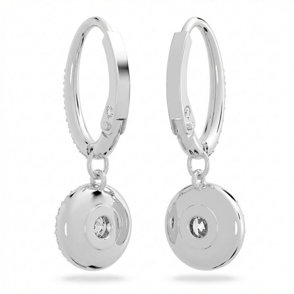 Focus on the wing silhouette, highlighting the crystal placement (pavé or single crystal), wing shape, and overall angelic aesthetic.