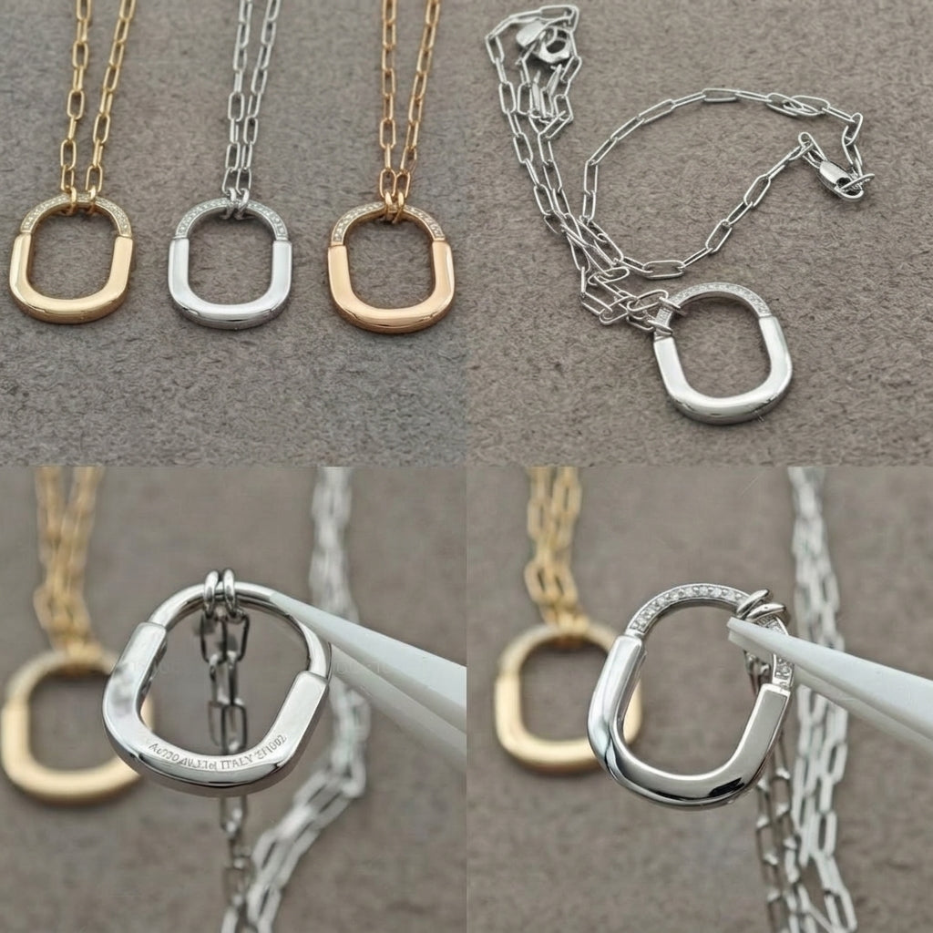 Four close-up views of a necklace with a large open oval pendant on a chain, shown in gold and silver tones on a textured gray background. Two top views show the full necklace, and two bottom views show the clasp mechanism held by white tweezers.