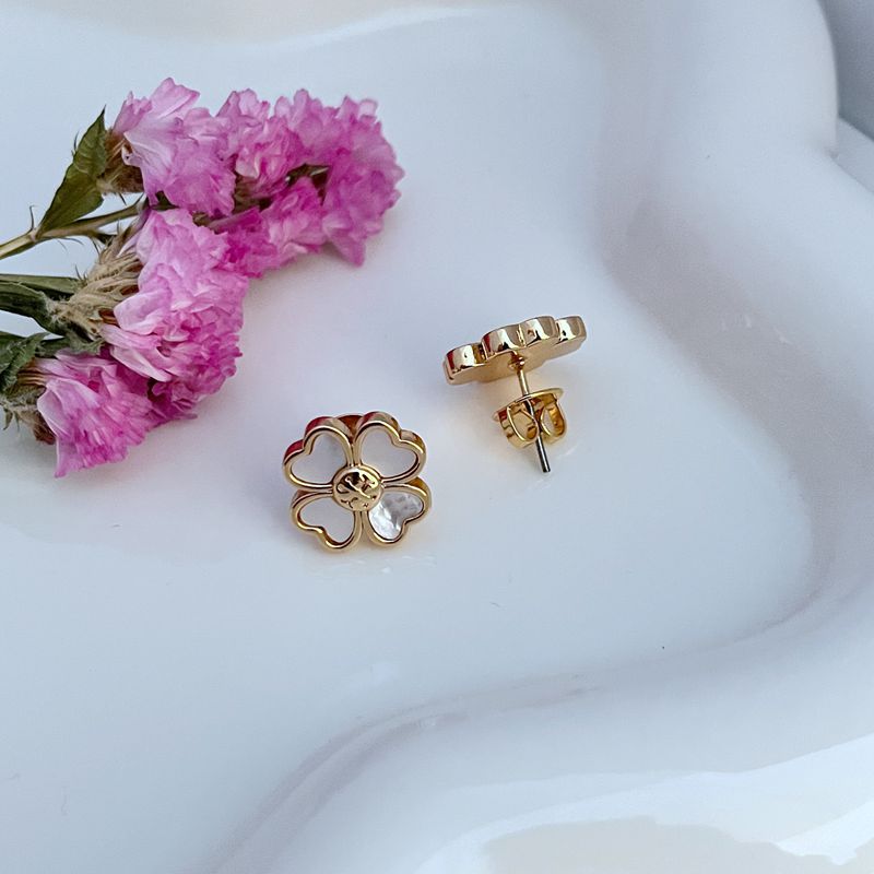 Clean grid showcasing individual pairs, highlighting variations in petal design, color, and material.