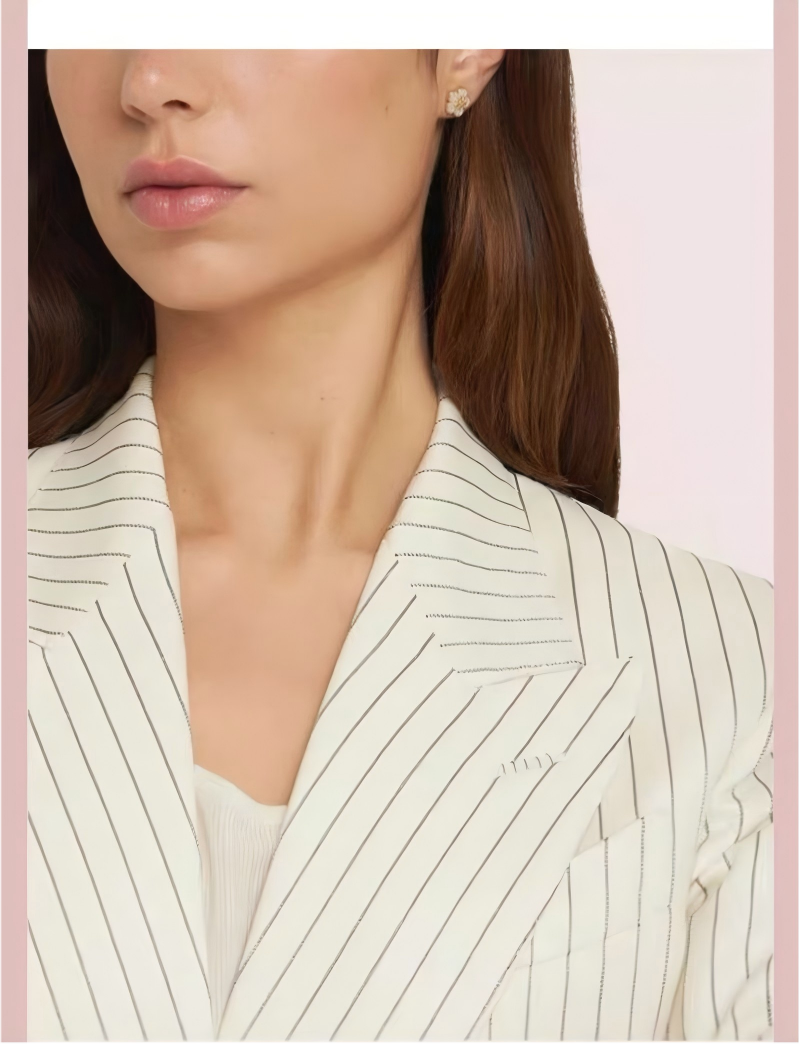 A woman with a bright, fresh smile wearing the studs. Her hair may be pulled back or styled in a way that subtly reveals the earrings, set in a sunny, casual environment (e.g., a garden café or a park).