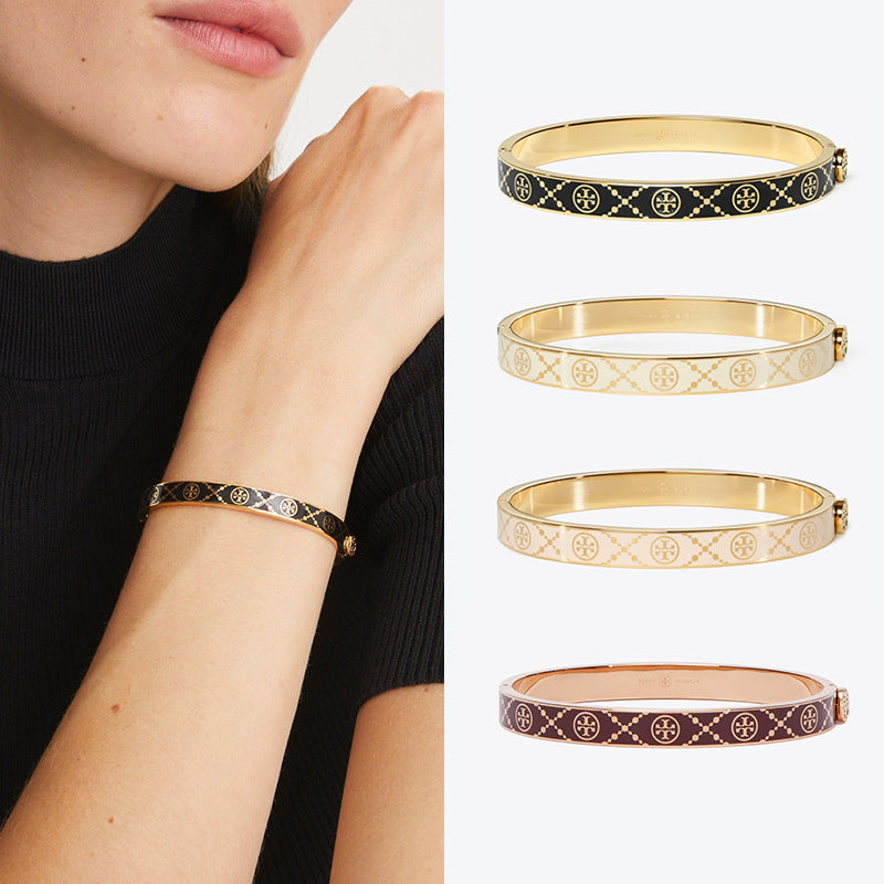 Bracelet worn on a wrist, showing its cuff-like fit and how it makes a clean, impactful statement.