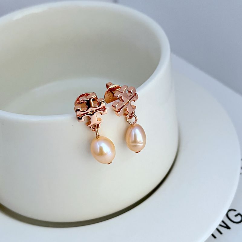 Styled in a soft, ethereal setting—like beside a crystal, star map, or soft fabric—to enhance their magical theme.