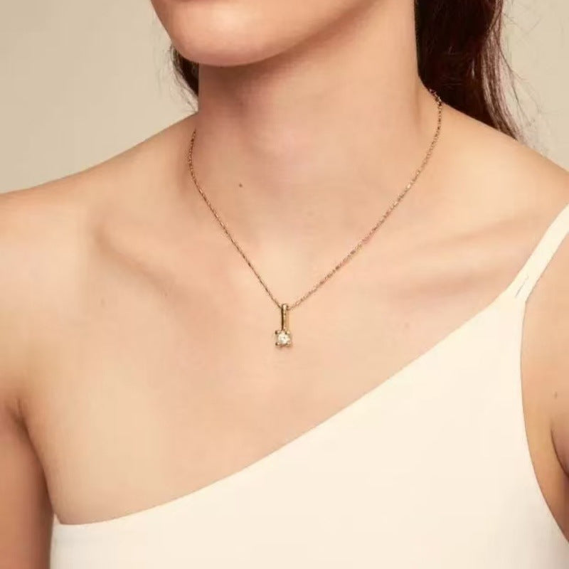 Necklace on neutral background. Alt: “UNOde50 Crystal Necklace – Silver Crystal Pendant.”
