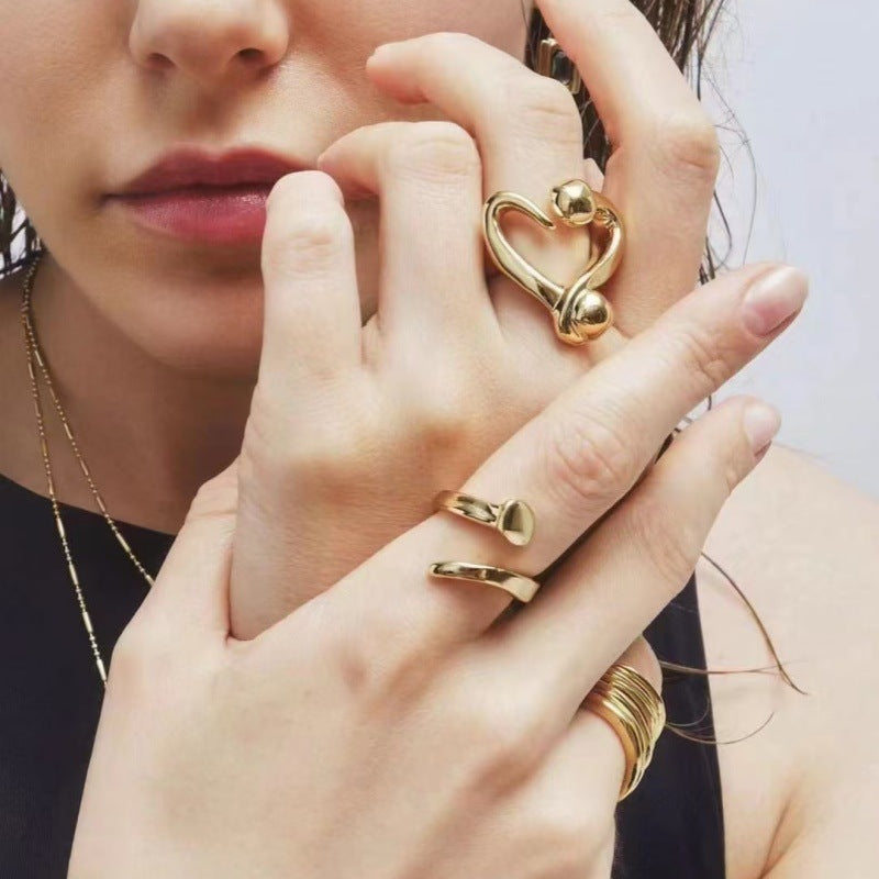 UNOde50 Open ring with a nailed heart