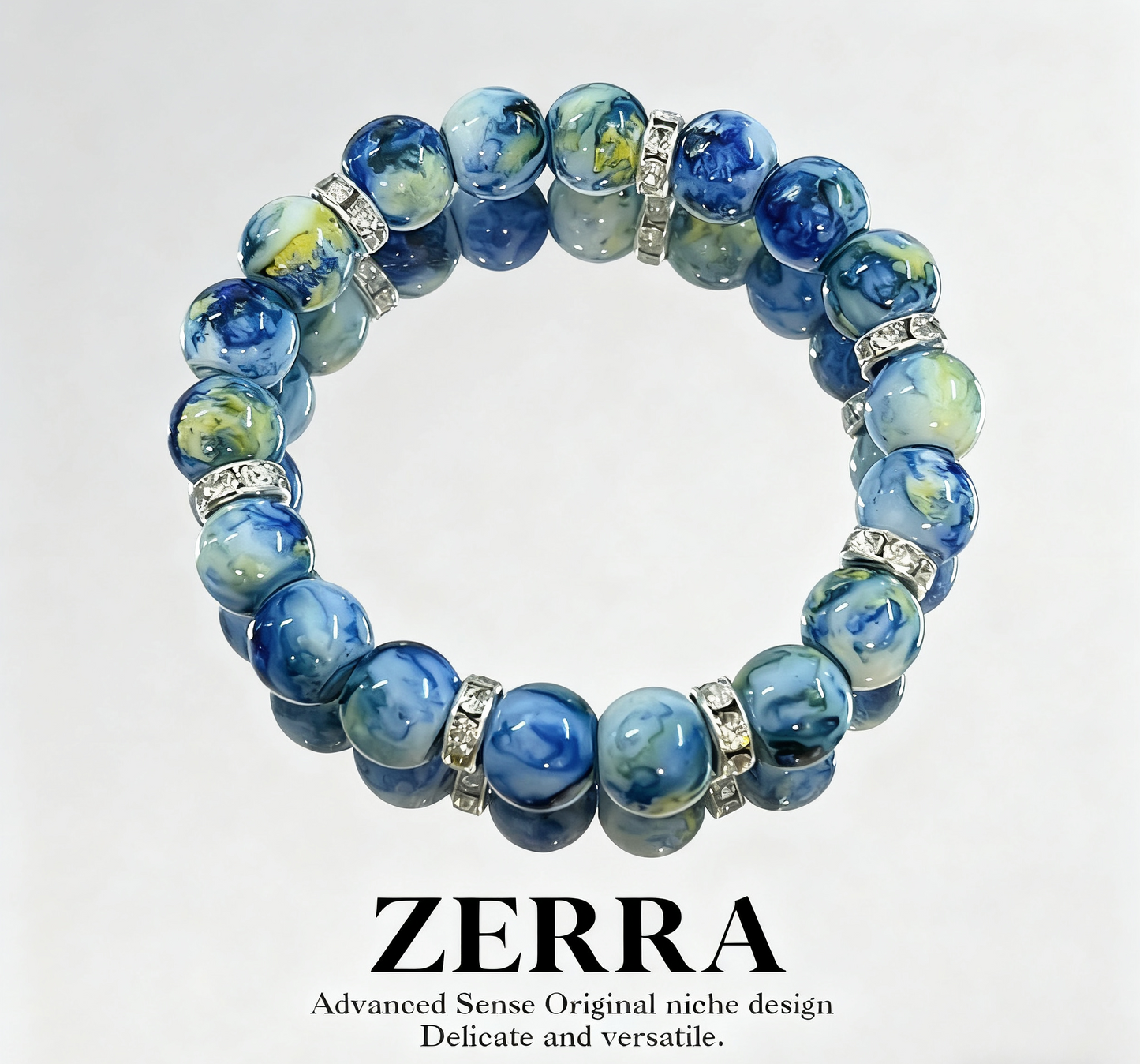 Blue beaded bracelet with silver accents on a white background, featuring the brand 'Zerra'.