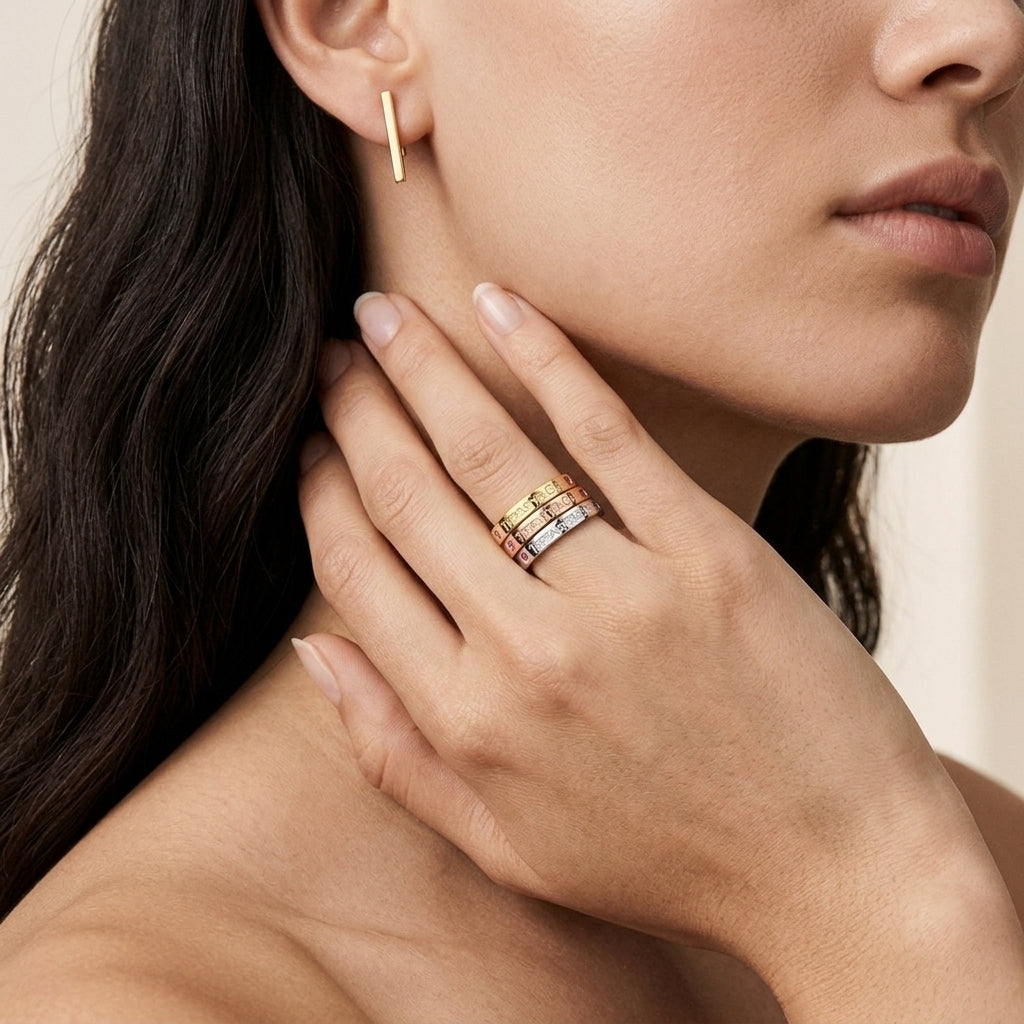 Zerra Jewelry Tiffany T&CO. Ruby Narrow Band Ring displaying a sleek gold band with a central ruby gemstone.