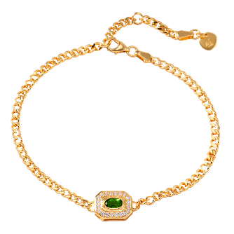 Gold bracelet with a green gemstone on a white background