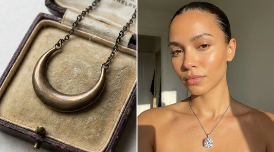 &nbsp;Elegant lifestyle portrait of a woman wearing a high-polish 925 sterling silver Moissanite necklace in natural side lighting, contrasted against an old faded brass necklace.