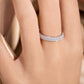 Close up view of woman wearing 0.49 ctw double row pave lab grown diamond ring on hand