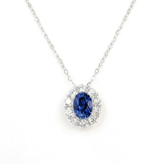 0.8ct oval cut blue sapphire pendant necklace, diamond halo setting, sterling silver.