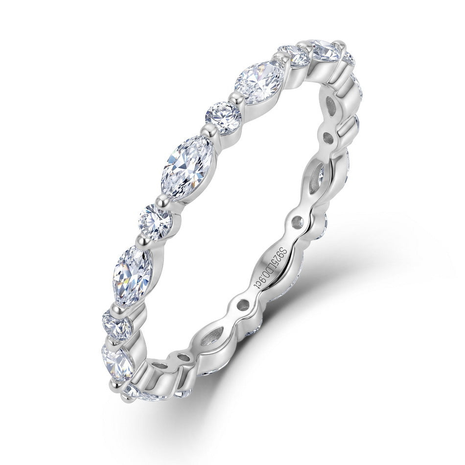 Angled standing view of 0.9ct marquise and round lab diamond stackable eternity band.