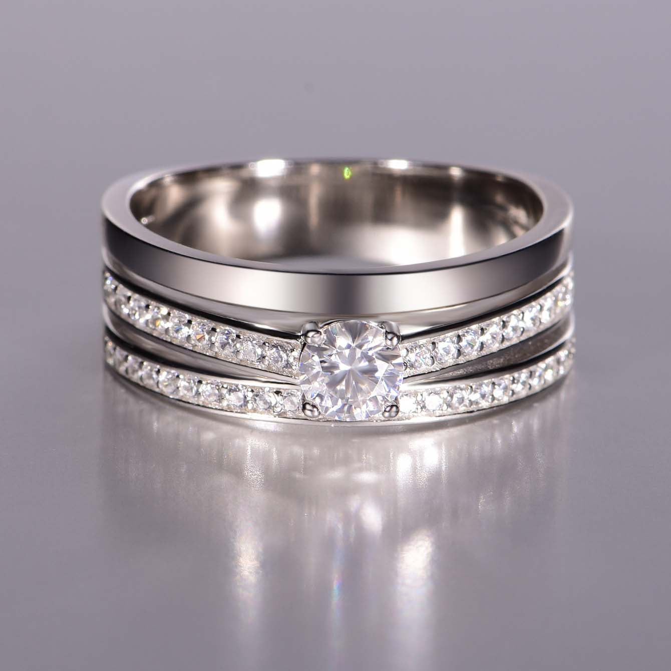  Yellow gold round moissanite ring on neutral background. Alt: “0.4 Carat Round Moissanite Engagement Ring – 18K Yellow Gold.”