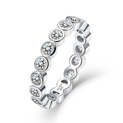 1.31 ctw bezel set round cut lab grown diamond eternity ring in sterling silver isolated on white background