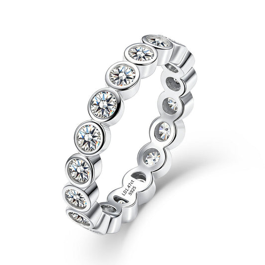 1.31 ctw bezel set round cut lab grown diamond eternity ring in sterling silver isolated on white background