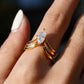 Set worn as double-stacked wedding rings. Alt: “Customizable Elegance: Marquise Diamond Bridal Set.”