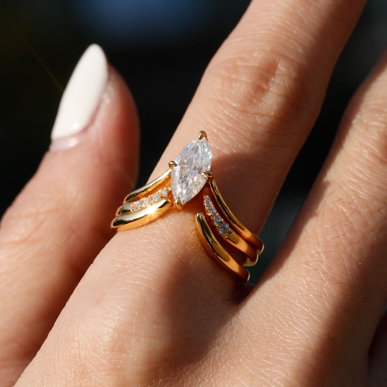 Set worn as double-stacked wedding rings. Alt: “Customizable Elegance: Marquise Diamond Bridal Set.”